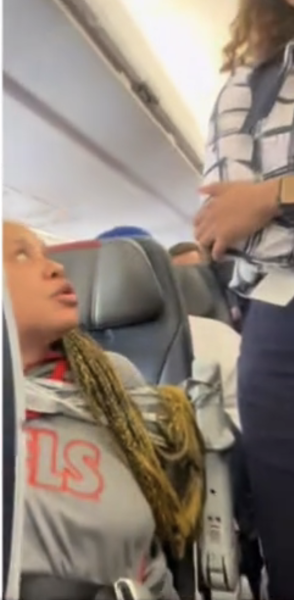American Airlines Passenger duct-taped to seat after attacking flight attendant and making bizarre threats mid-air