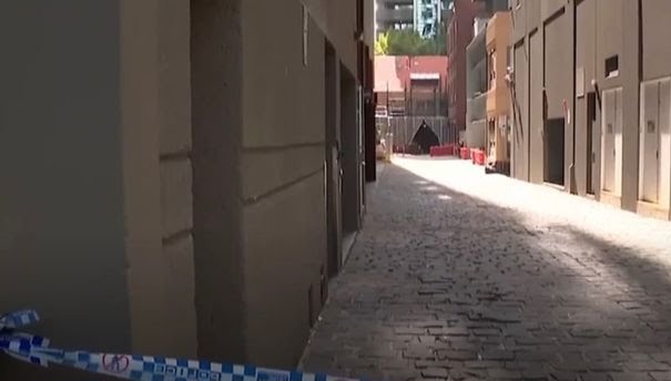 Male pedestrian crushed by woman who jumped off Melbourne building in suspected su!cide attempt