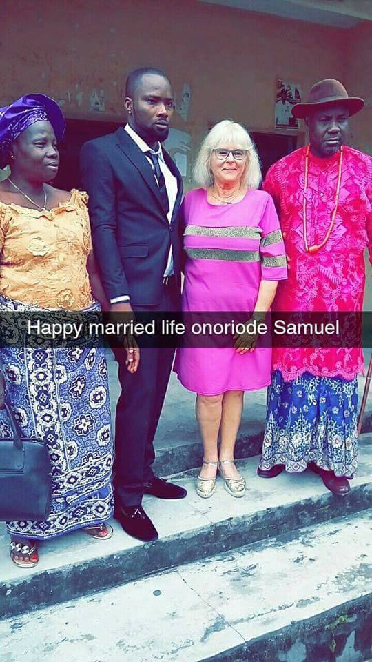 LOL, Young Nigerian man weds his much older white lover...and he couldn't even manage a smile at his wedding...PHOTOS