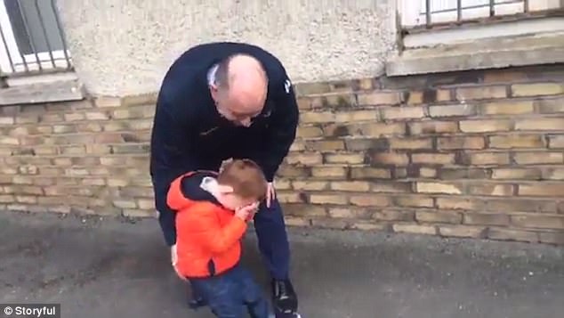 The heart-warming moment a little girl rushes to kiss her soldier father after he returns home but her brother is so overcome with emotion he can?t move