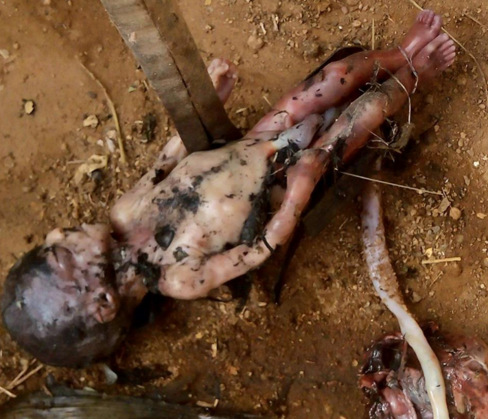 Kids found a dead baby in gutter in Kaduna and mistook it for a toy (graphic photos)