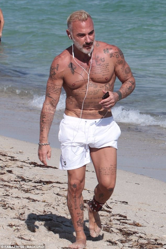 Shirtless Italian playboy Gianluca Vacchi and his eggplant pictured at the beach (Photos)