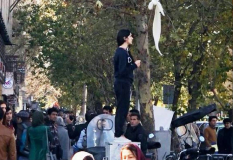 Iranian women put their scarves on sticks in the middle of busy streets to protest mandatory Hijab laws