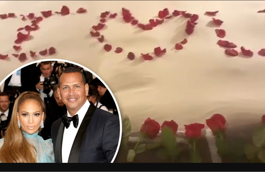 Alex Rodriguez shows off decorated bed with roses where he proposed to