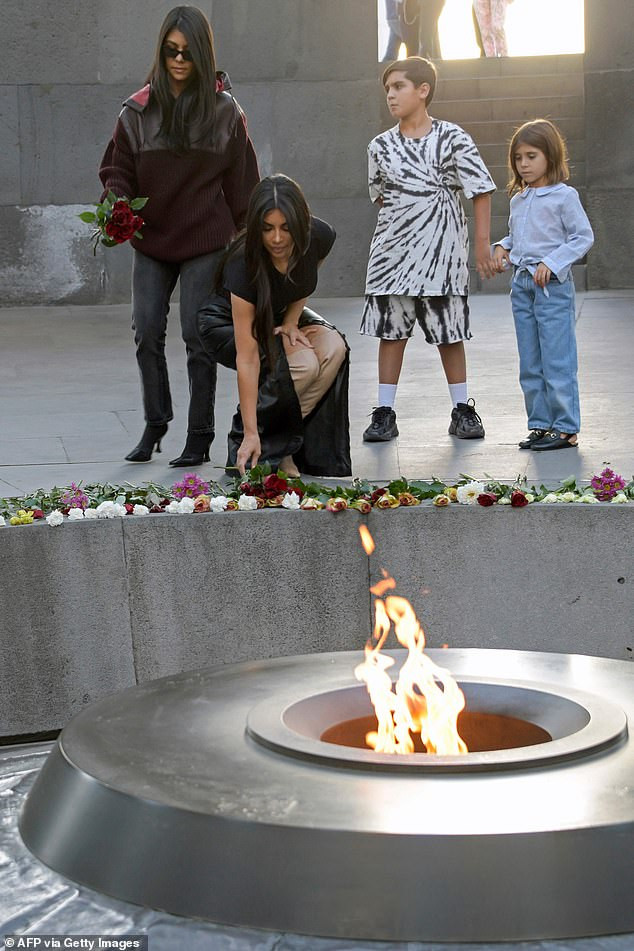 Kim and Kourtney Kardashian lay flowers at the Armenian Genocide Memorial Complex (photos)