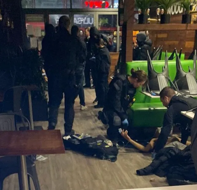 Photo shows boy, 17, getting CPR in chicken shop after being shot in the streets of London