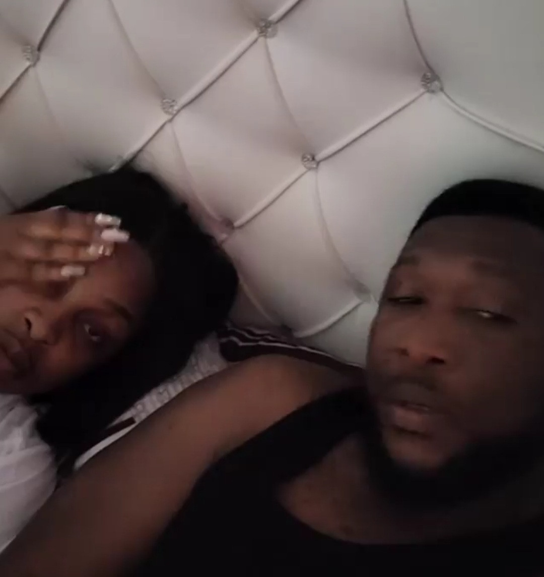 "So, I must be following you on Instagram?" Nollywood Director, Tchidi Chikere asks wife, Nuella as he releases video of them on their bed to dispel rumours their marriage crashed