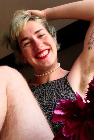 Woman who stopped shaving body hair boldly shows off her body as she says people now call her a man because of her beard 