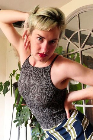 Woman who stopped shaving body hair boldly shows off her body as she says people now call her a man because of her beard 