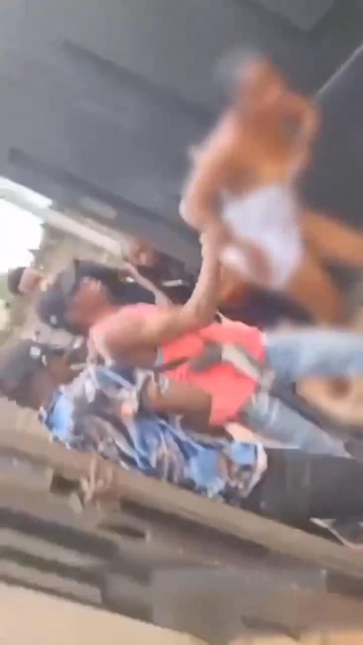 Female corps member is str!pp�d completely n@k3d and b?aten up by g^n-wielding Anambra vigilante officials in shocking video