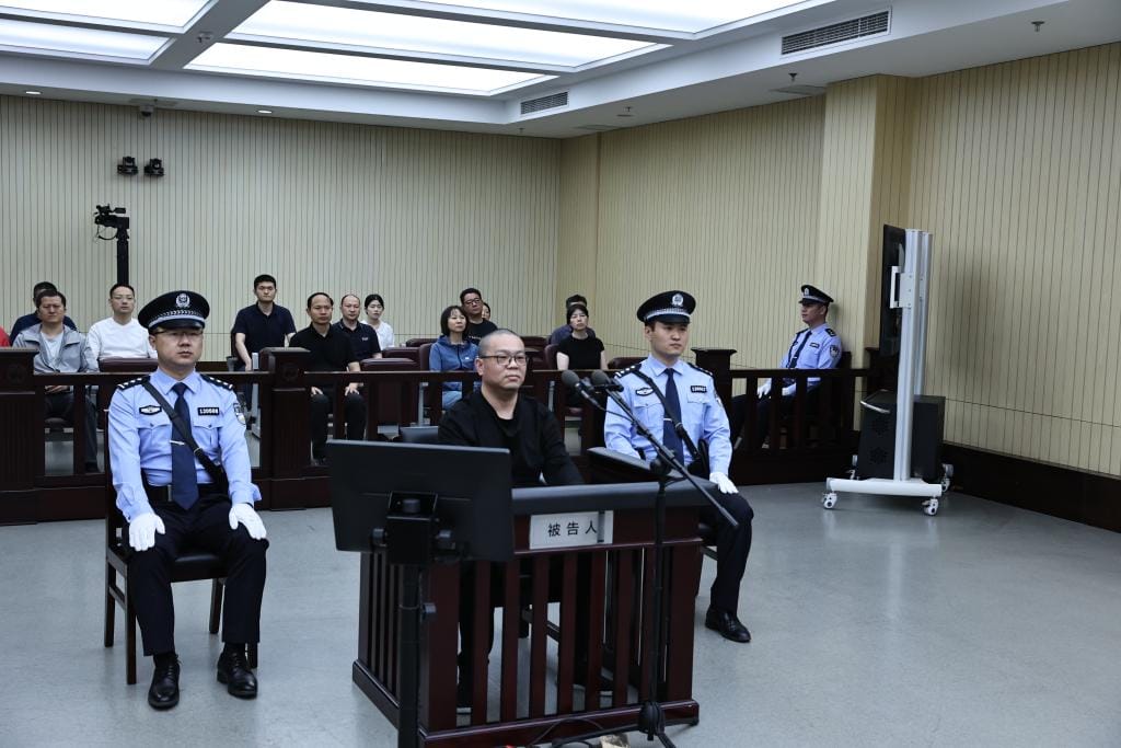 China executes former senior banker for taking over $156m in bribes