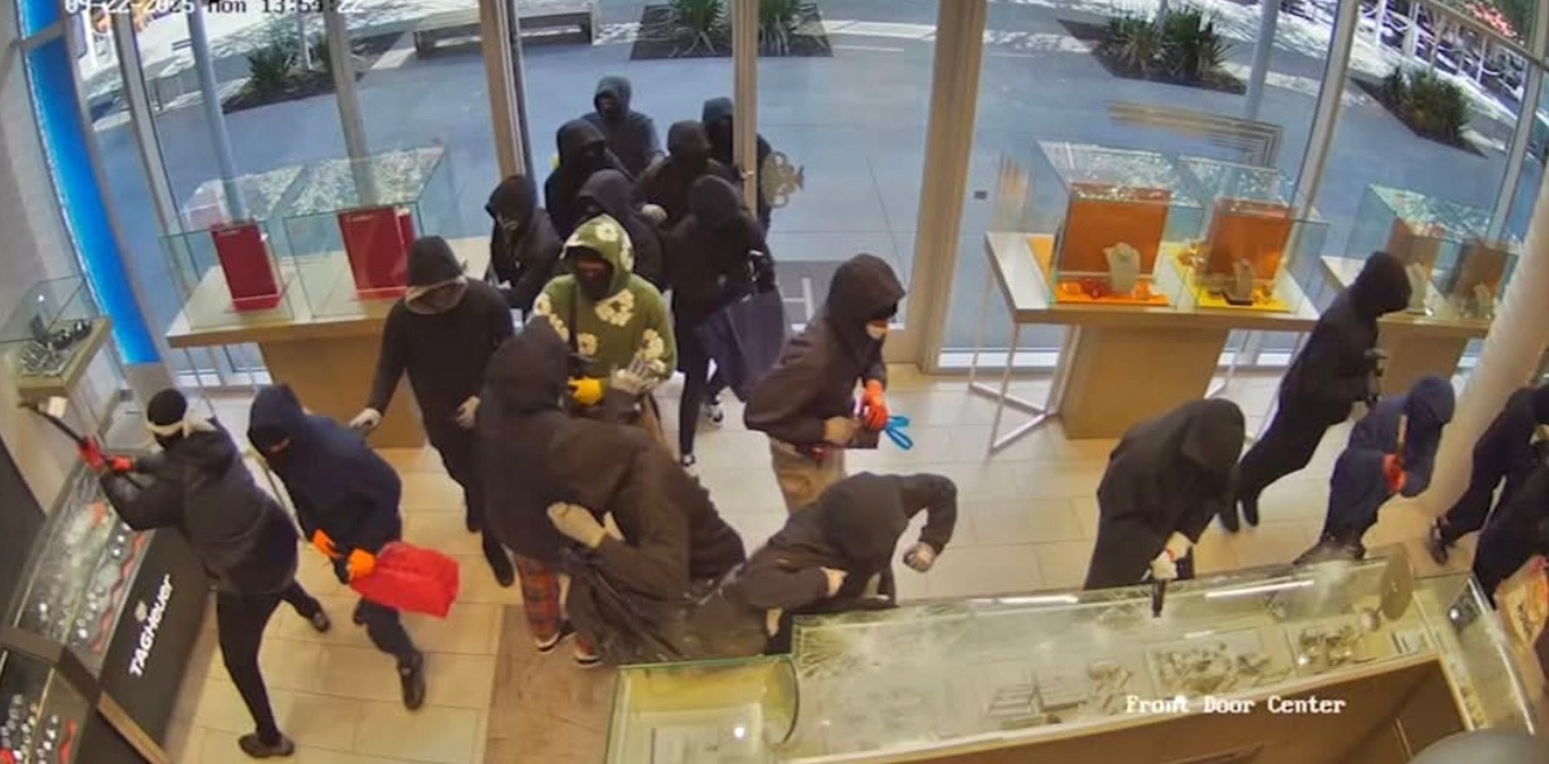 Wild video shows over 25 masked armed robbers storming California jewelry store in $1M raid