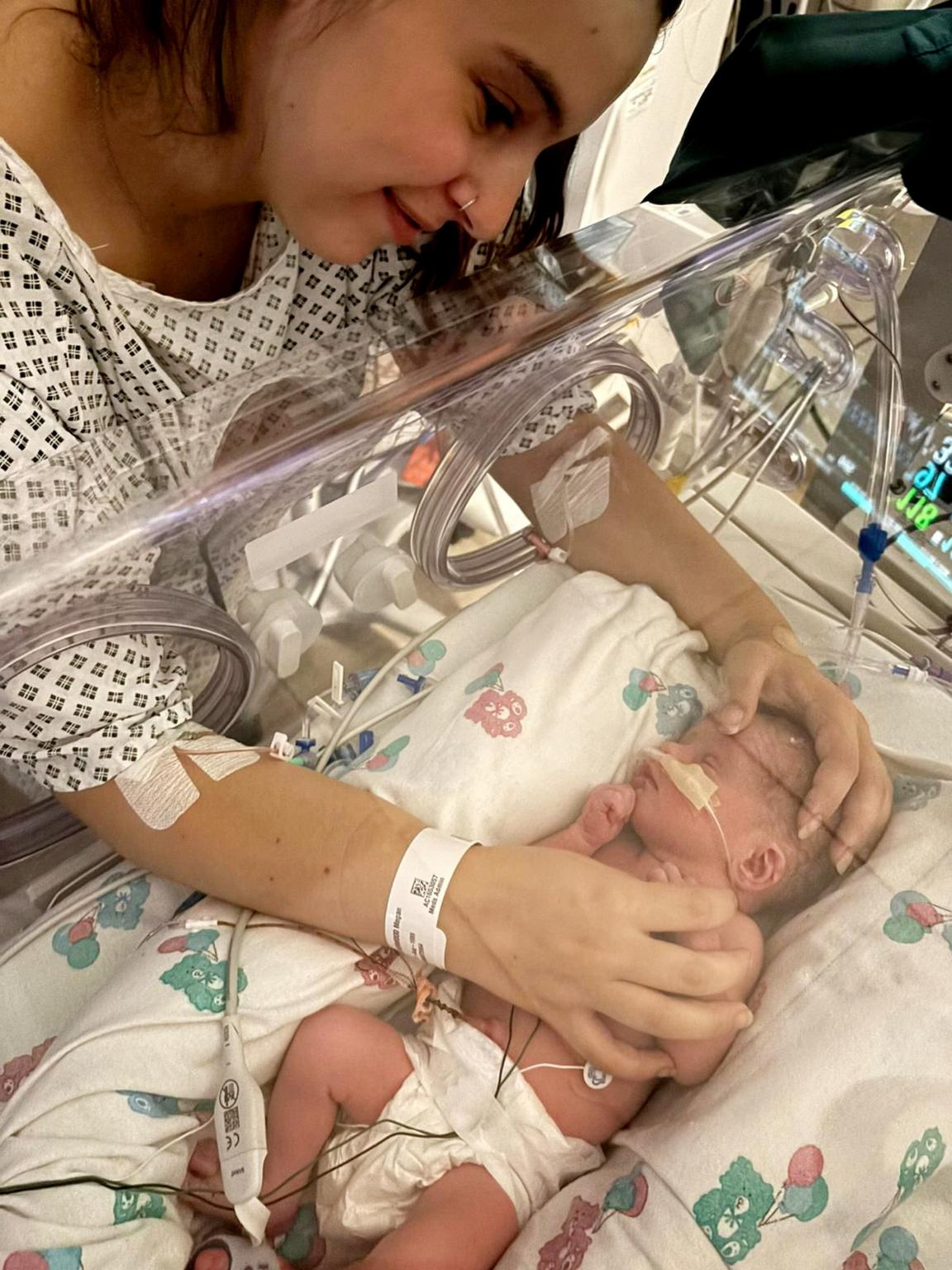 Woman rushed to hospital for appendicitis ends up giving birth to surprise baby