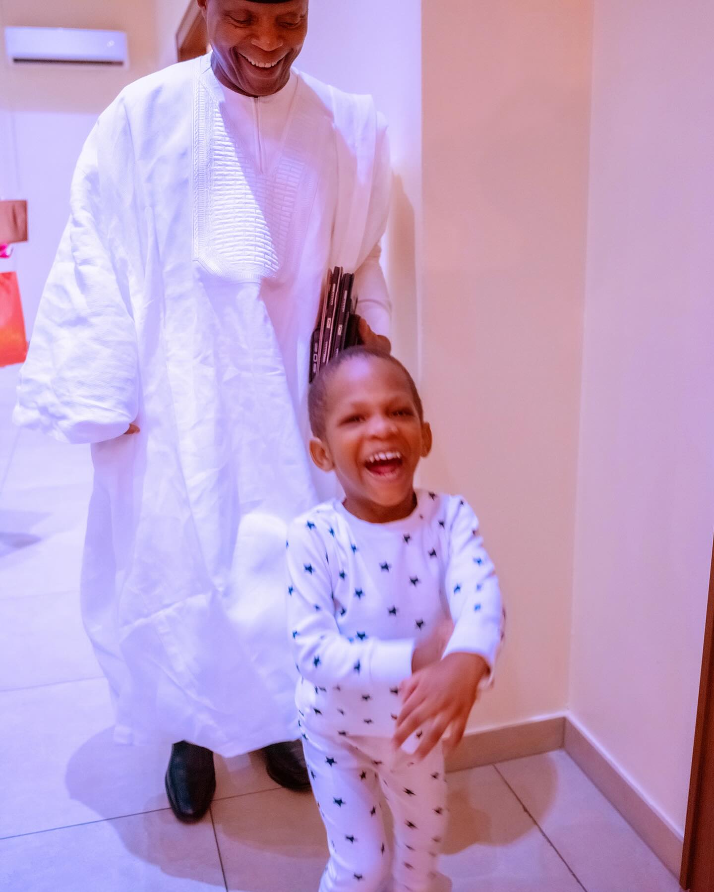 Osinbajo shares heartwarming photos of he and his grandson